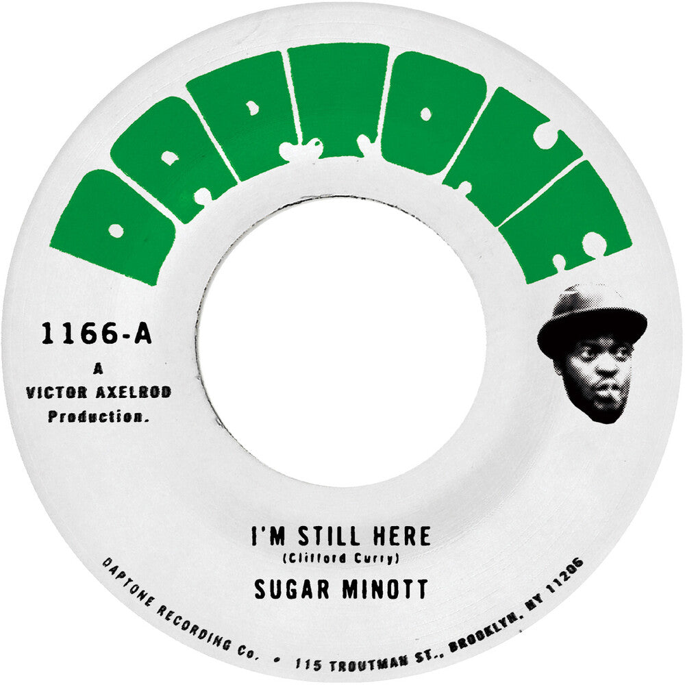 the album cover for Sugar Minott - I'm Still Here B/W I'm Still Here - Version
