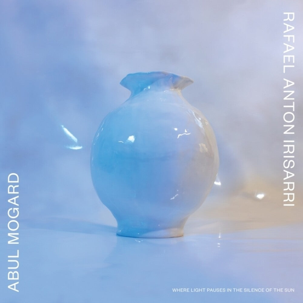 the album cover for Abul Mogard / Rafael Anton Irisarri - Where Light Pauses In The Silence Of The Sun (Wht)