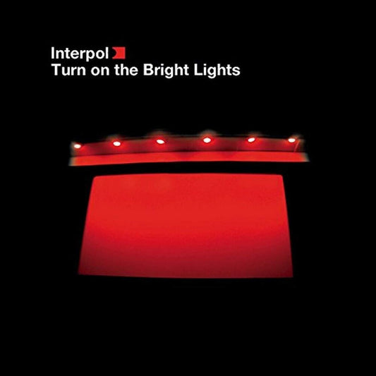 the album cover for Interpol - Turn on the Bright Light