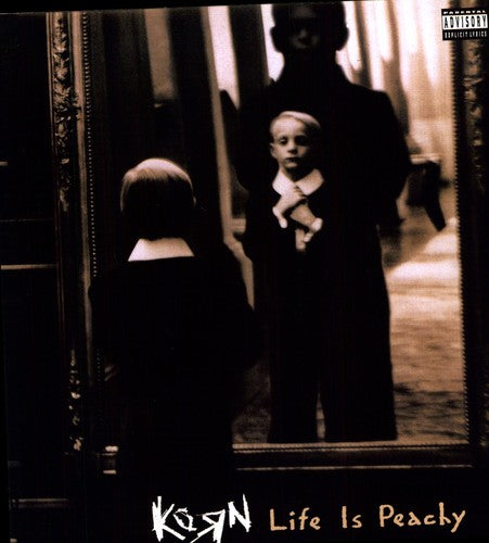 the album cover for Korn - Life Is Peachy [180 Gram]