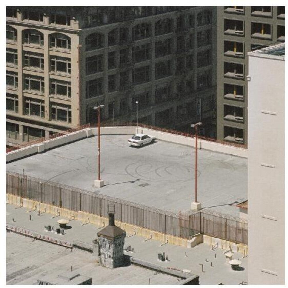 the album cover for Arctic Monkeys - The Car