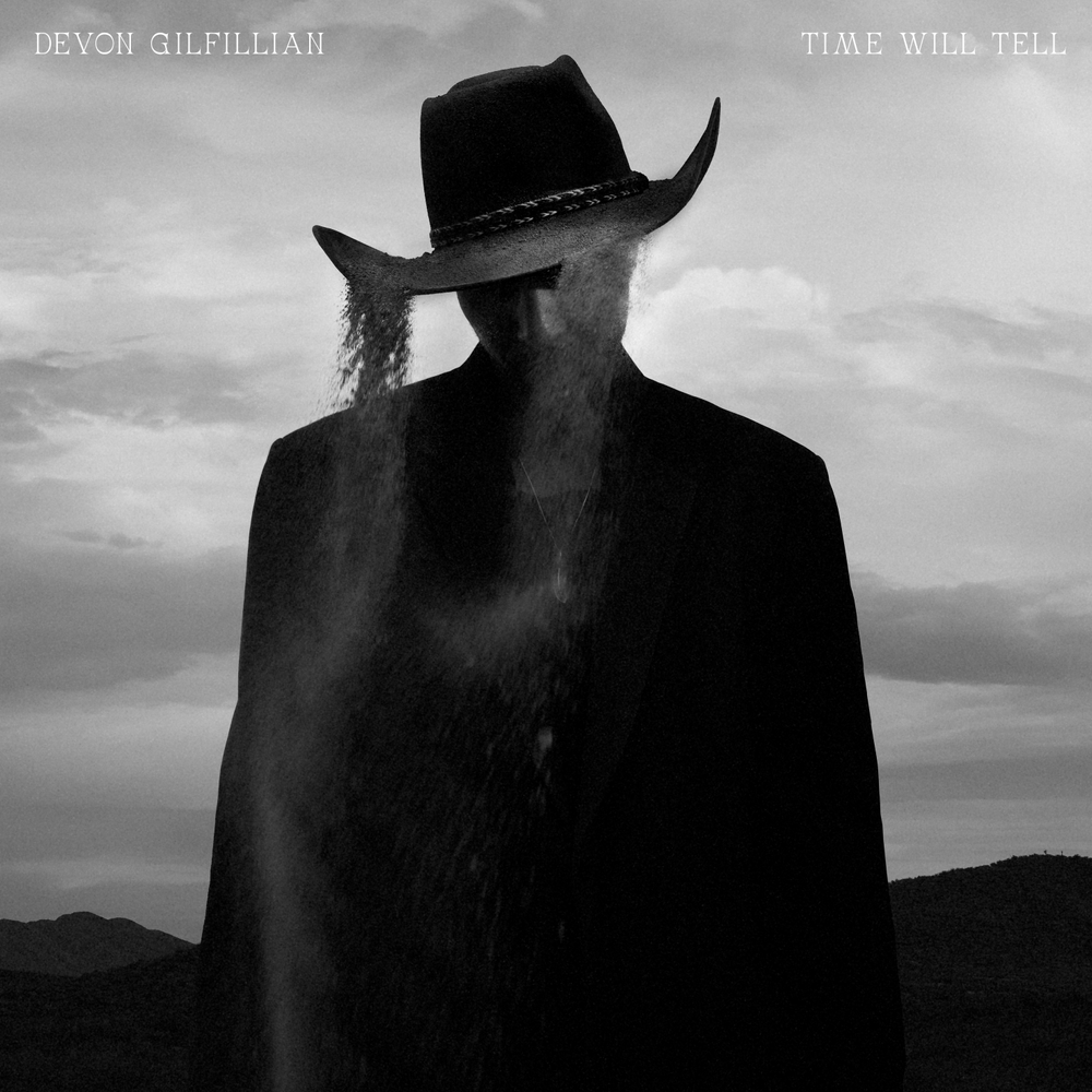 the album cover for Devon Gilfillian - Time Will Tell [Eco-mix Yellow vinyl]