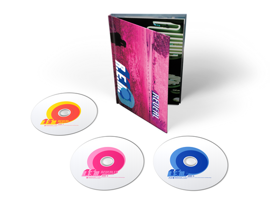 the album cover for R.E.M. - Reveal - 25th Anniversary Edition [2 CD + BR * hardbound book]
