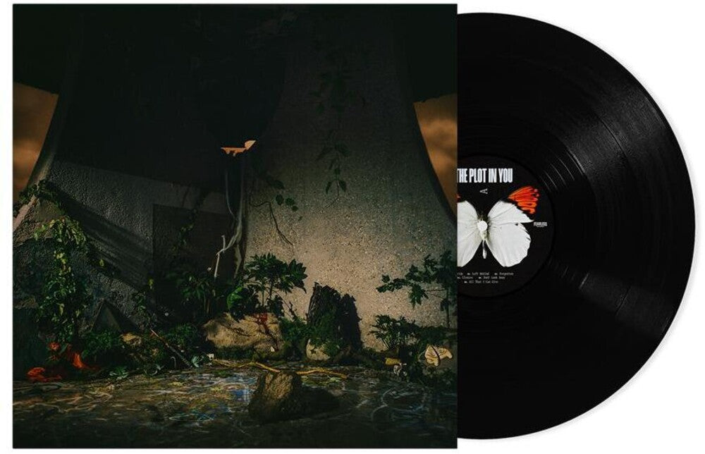 the album cover for The Plot In You - The Plot In You